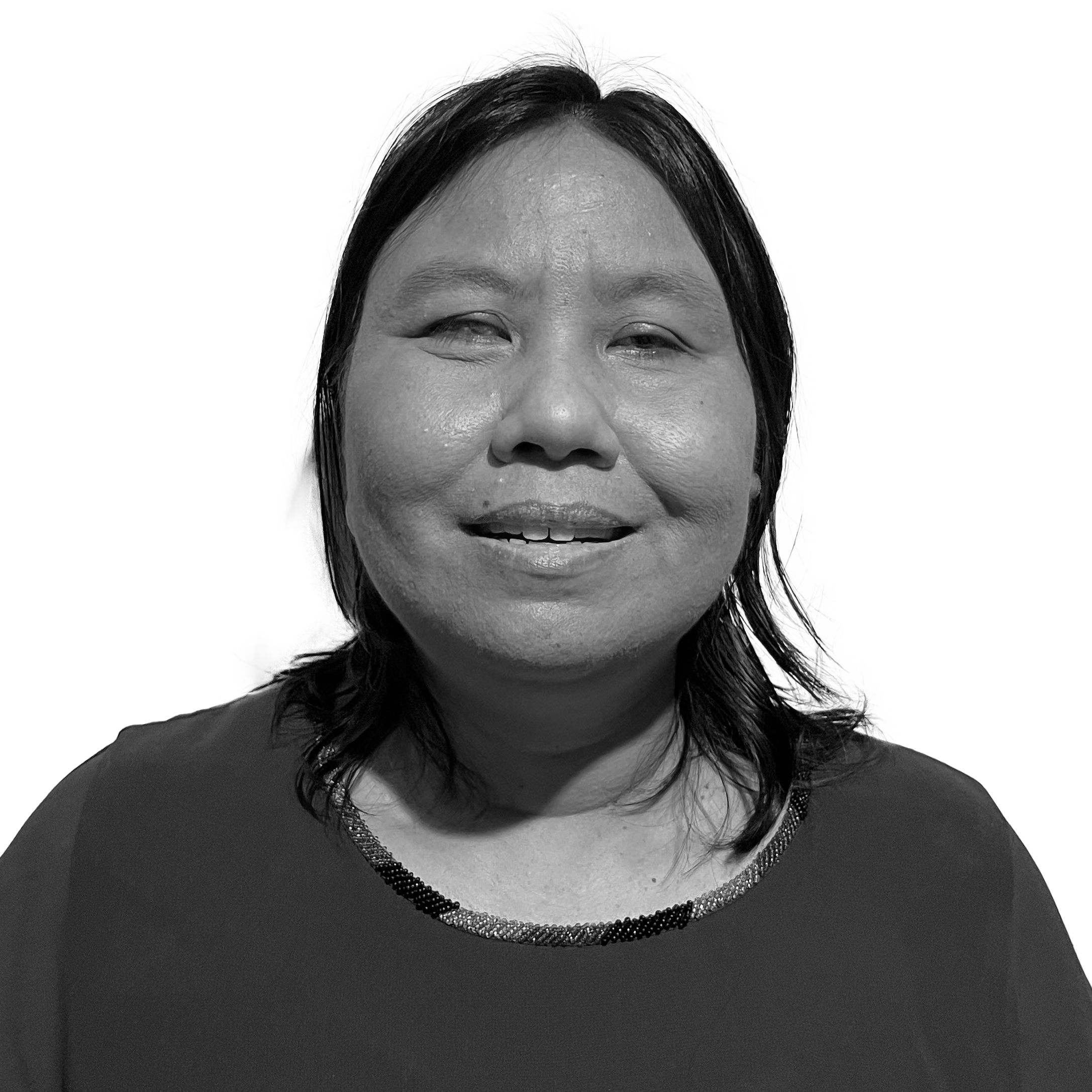 Mahretta "Retta" Maha smiles at the camera.