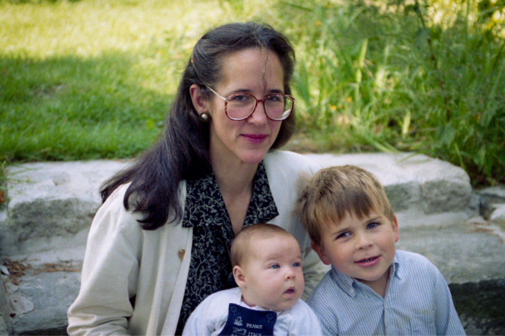 Marian's mother poses with her two young children.