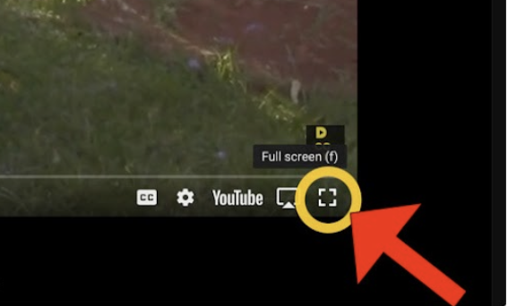 A big red arrow icon points to a brackets icon on the bottom right corner of a YouTube player. There is a yellow circle icon highlighting the brackets icon. A small text box above the brackets icon says "Full screen (f)."