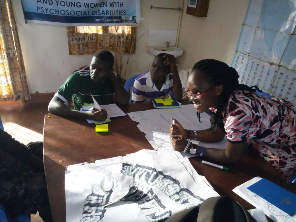 A photo of Esther Suubi at her work.