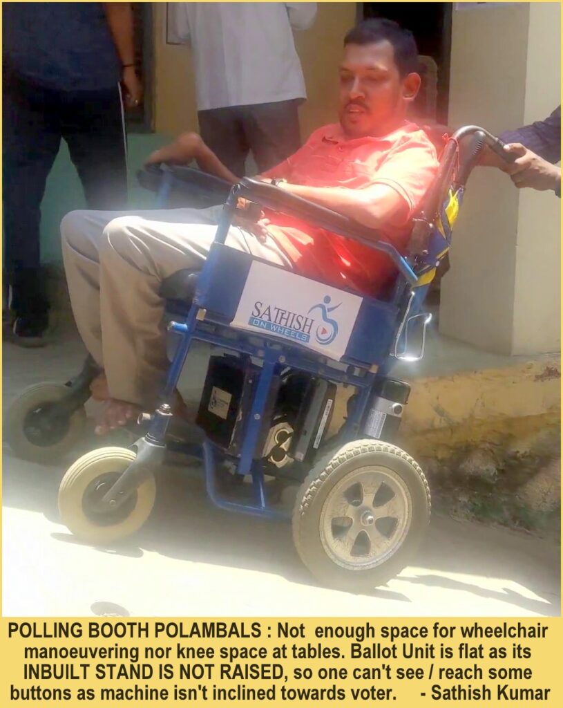 A man in a wheelchair is pushed up a steep ramp.
