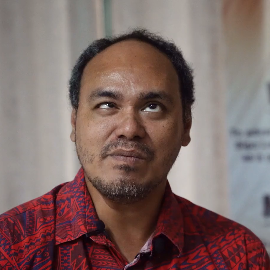 A closeup of a blind Samoan man.