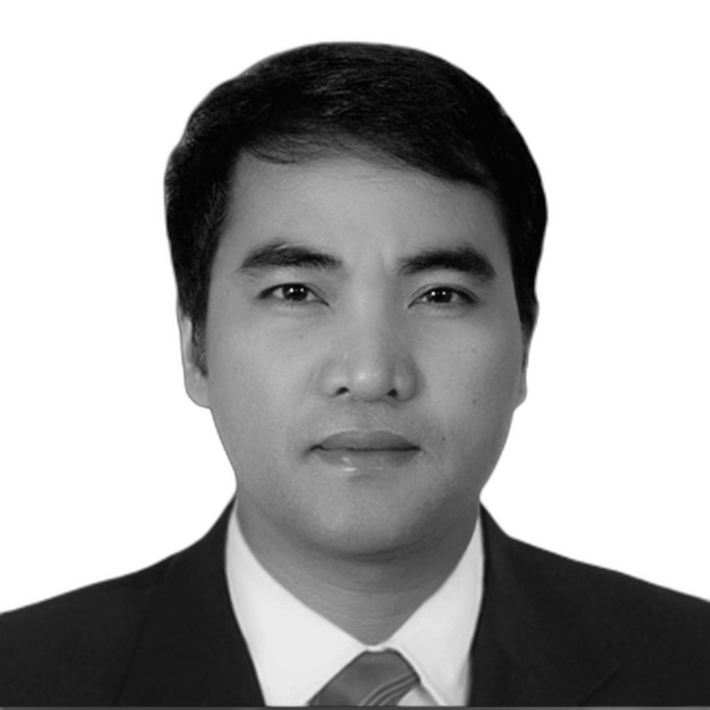 Rhomir S. Yanquiling looks into the camera and appears serious.