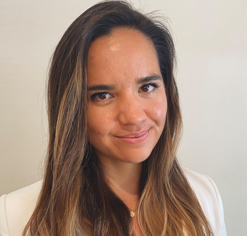 Laura Murchie, staff attorney at Disability Law United, smiles into the camera.