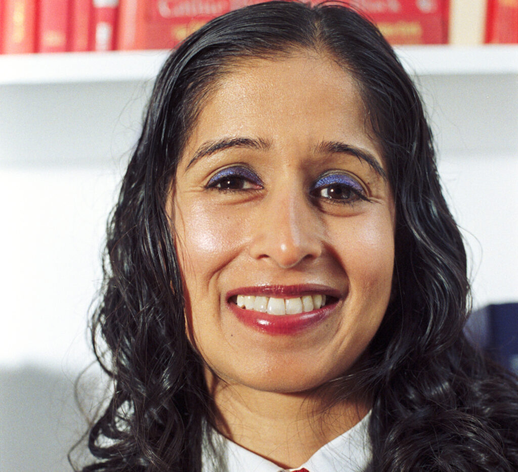 Qudsiya Naqui smiles into the camera.